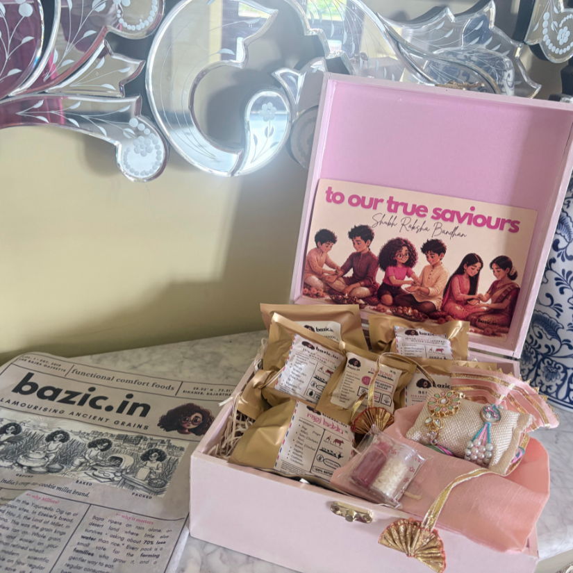 contents of Bazic rakhi gift box: khajoor pak, sattu barfi, ragi laddoo, rajgira chikki, jowar namkeen and cookies
