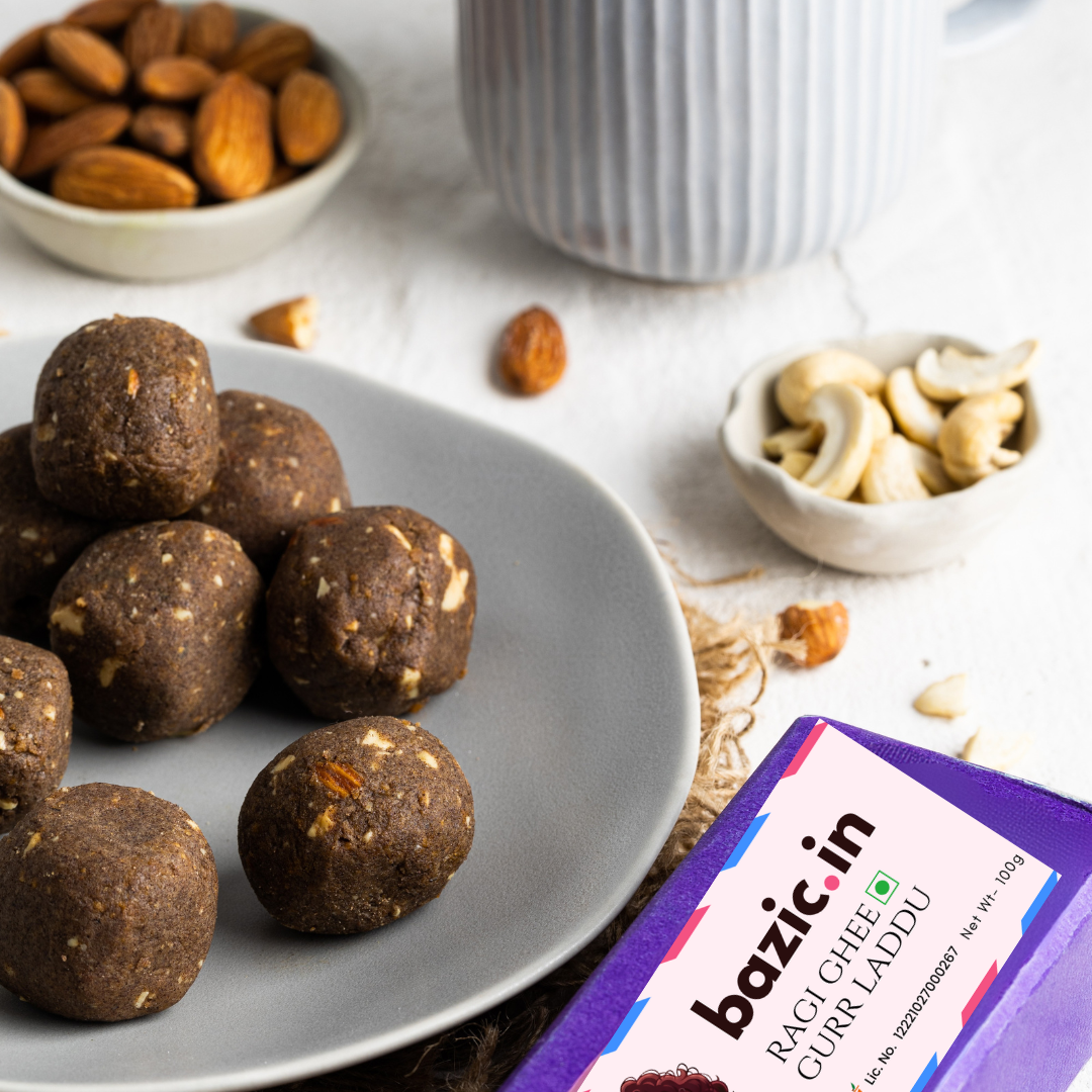 Close-up of Bazic Ragi Laddu surface texture — ragi, sattu and ghee bound the traditional way
